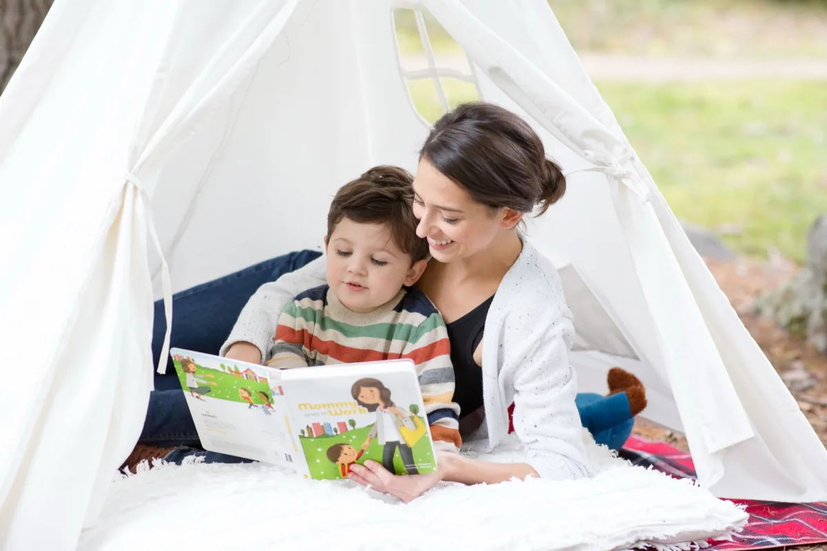 A parent and child reading together
